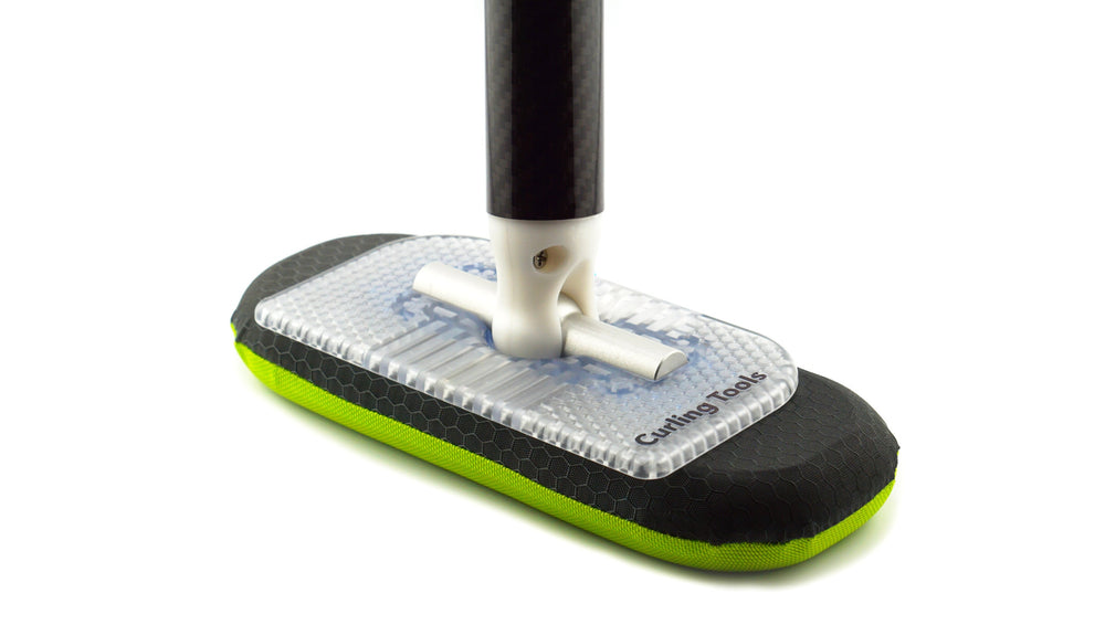 CoreBroom head with a translucent body and yellow fabric sleeve